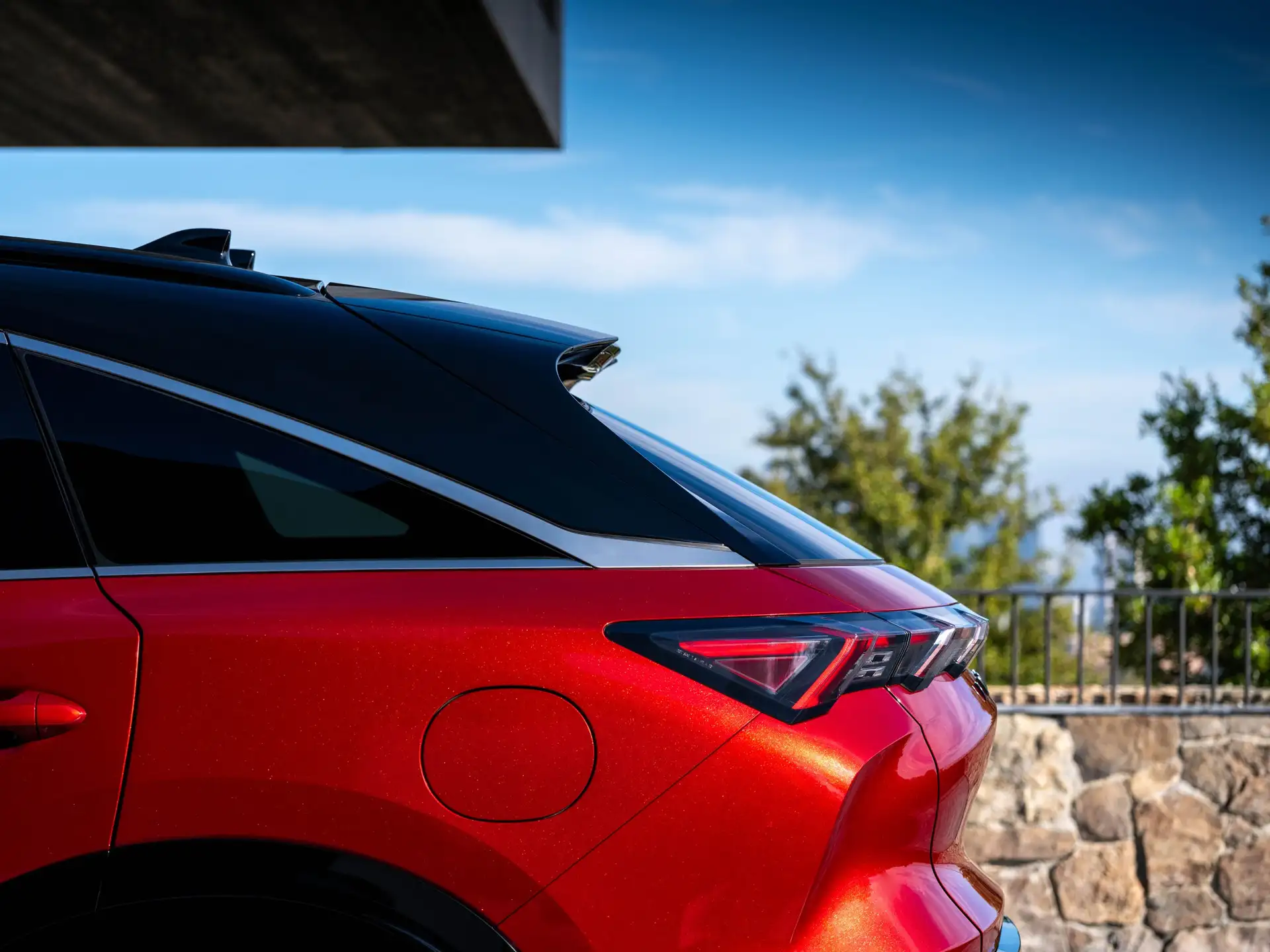 2027 INFINITI QX65 - Metallic Red Rear Quarter With Angular LED Taillights