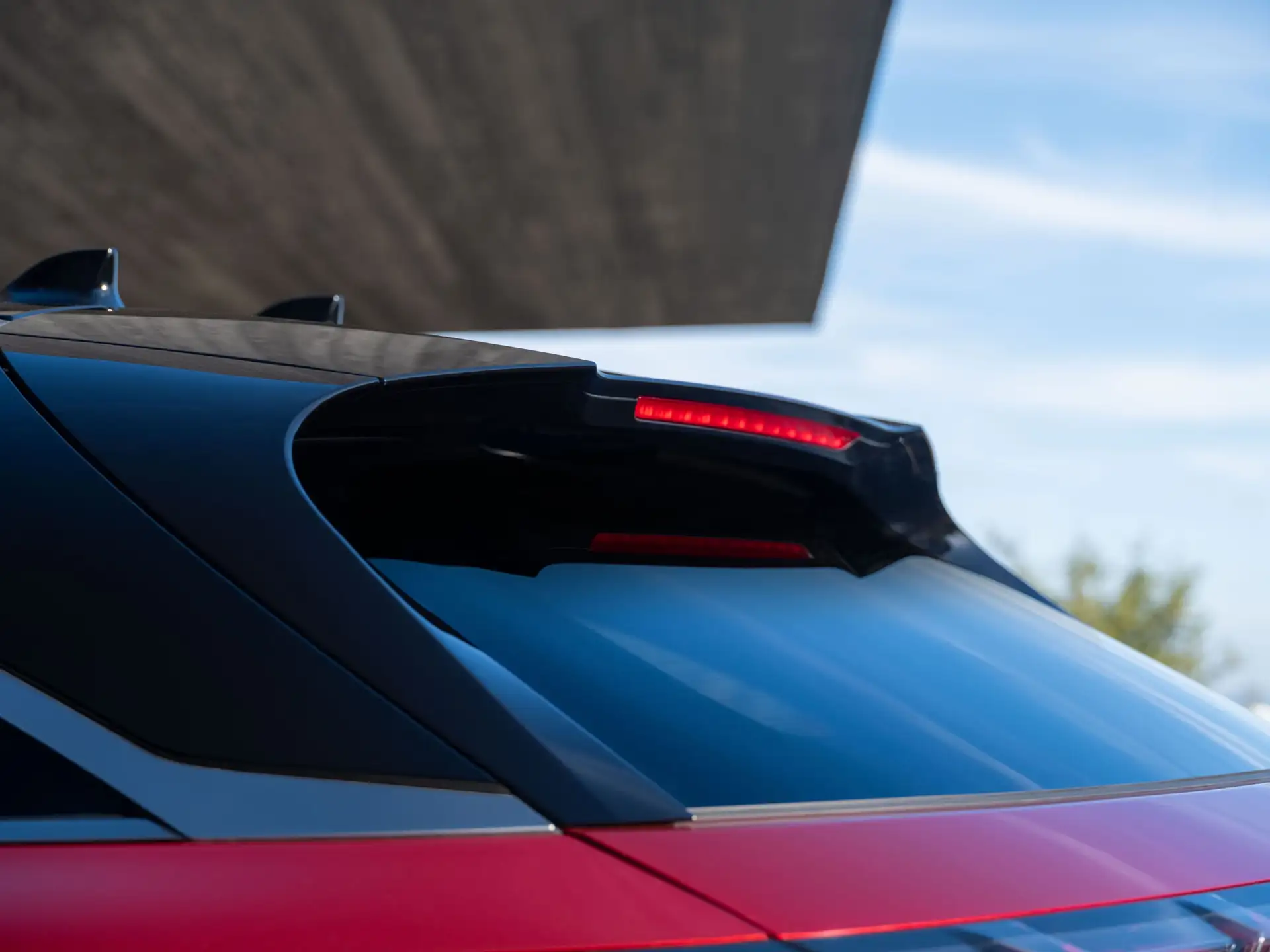 2027 INFINITI QX65 - Sleek Black Rear Spoiler With Red LED Lightbar