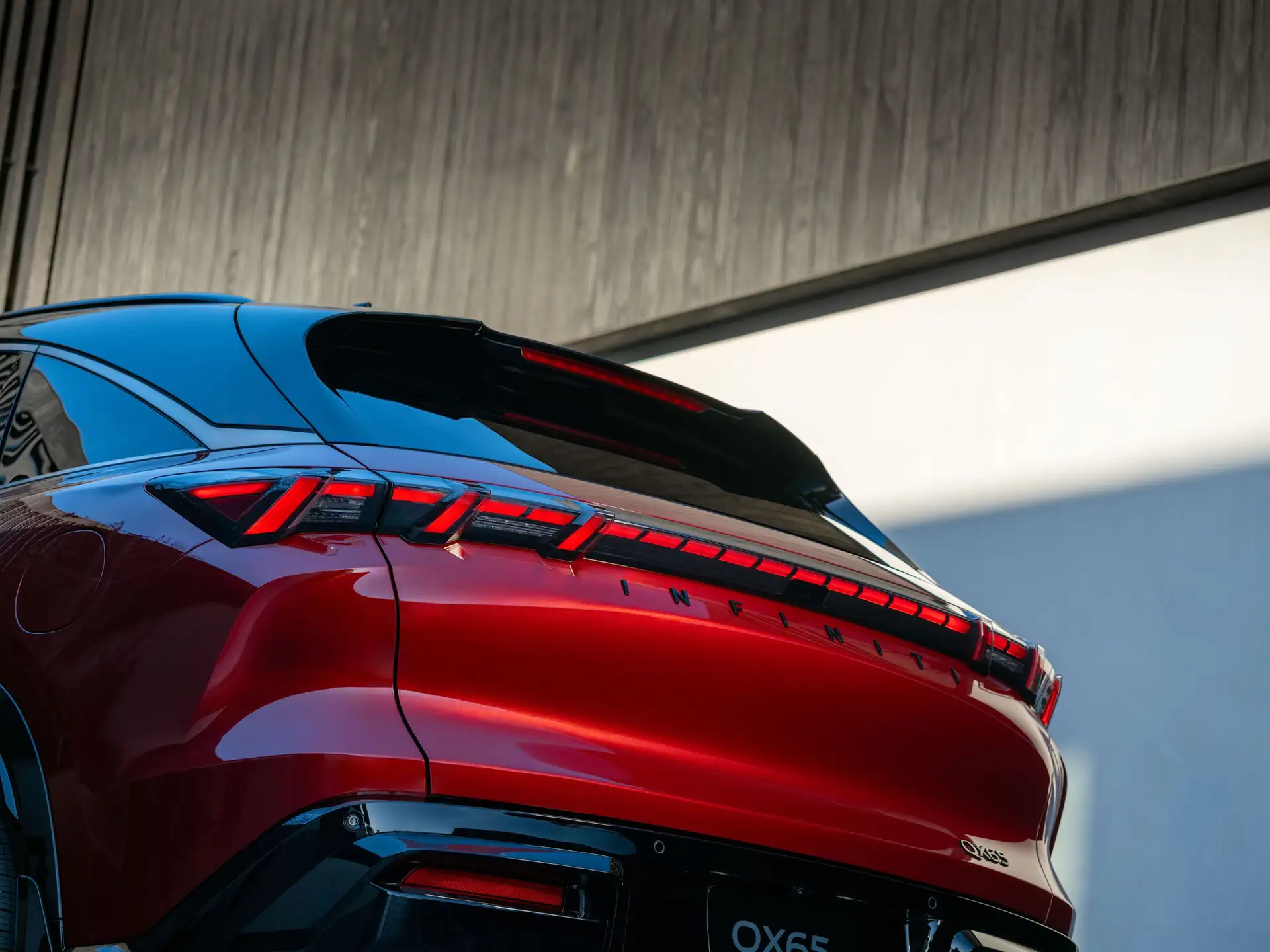 2027 INFINITI QX65 - Vibrant Red Infiniti Rear With Full LED Taillights