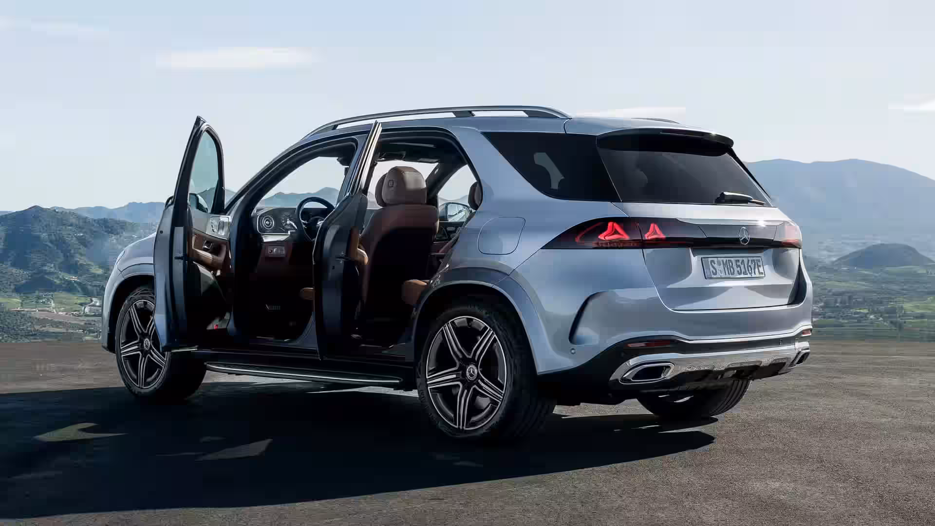 2027 MERCEDES BENZ GLE - Sleek Silver GLE Rear Quarter With Tan Leather Seats