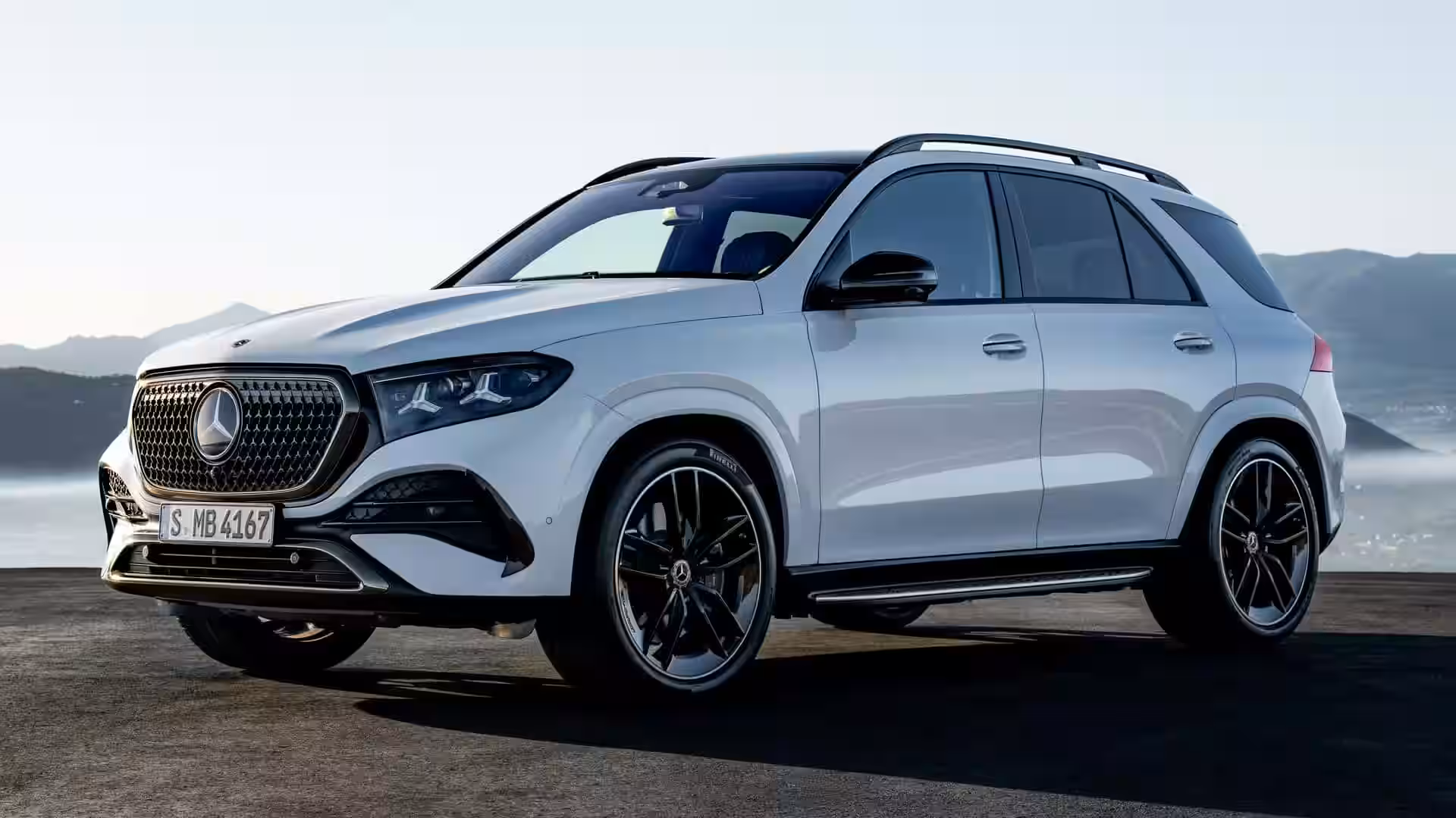 2027 MERCEDES BENZ GLE - Sleek White Mercedes Front With Black Grille And Wheels