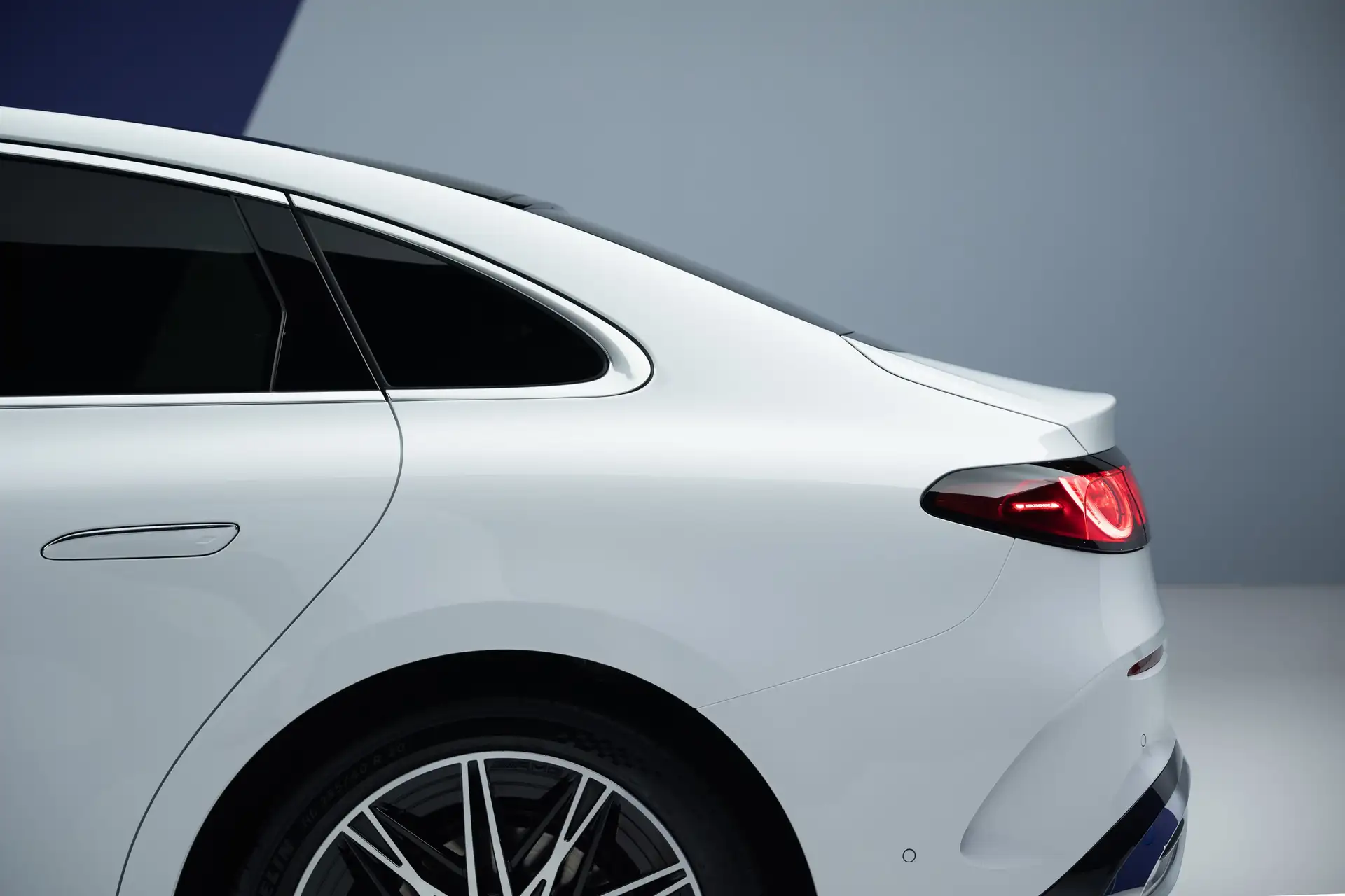 2027 Mercedes Benz C Class EV - White Coupe Rear Quarter With LED Tail Light