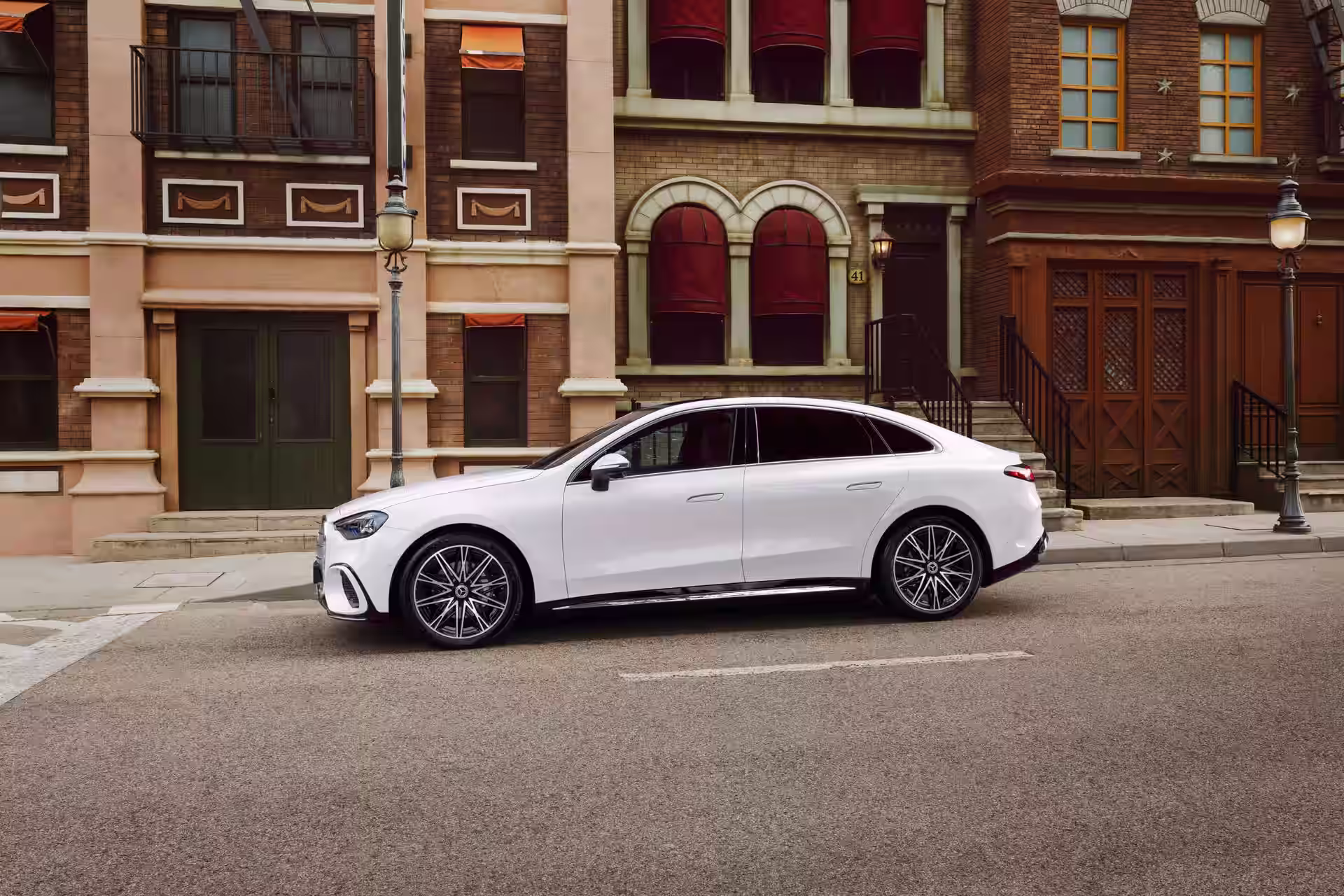 2027 Mercedes Benz C Class EV - White Luxury Sedan Side Profile With AMG Style Wheels