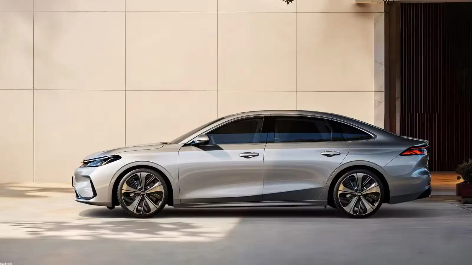 Geely Galaxy A7 EV - Sleek Metallic Silver Sedan Side With Large Black Wheels