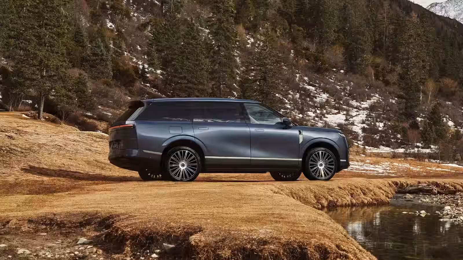 Xpeng GX - Sleek Gunmetal SUV Rear Side With Large Rims